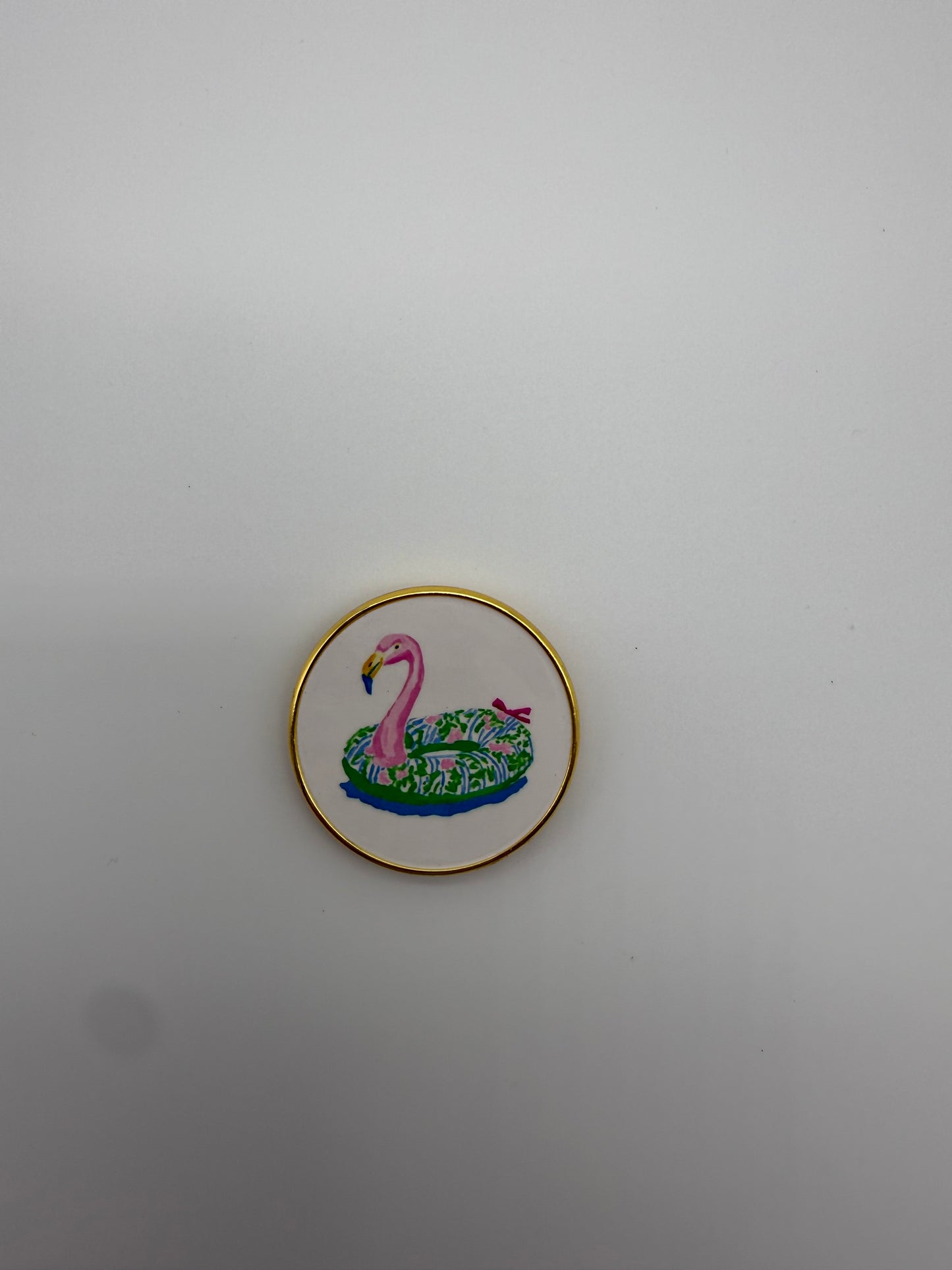 Flamingo float needle minder