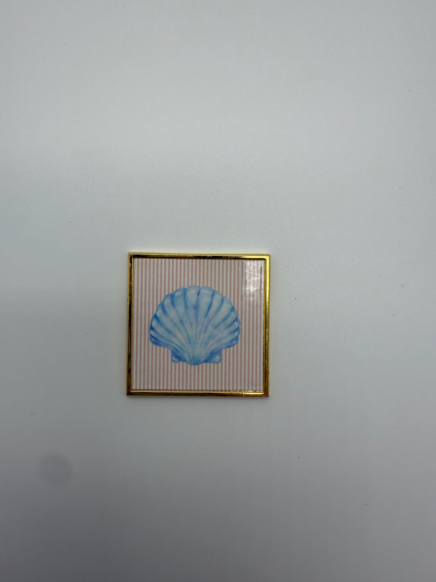 Shell needle minder